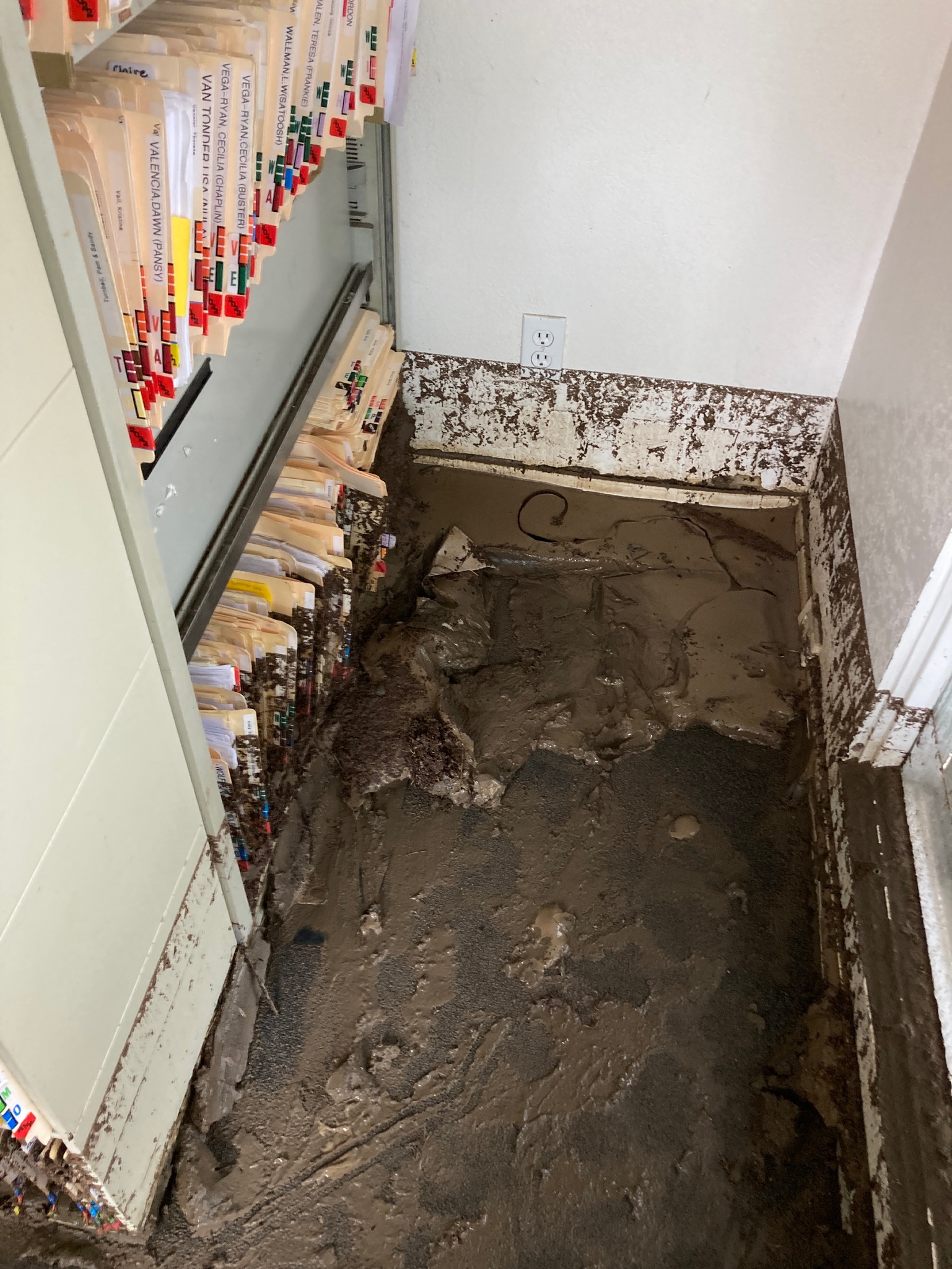 A room with water covering the floor