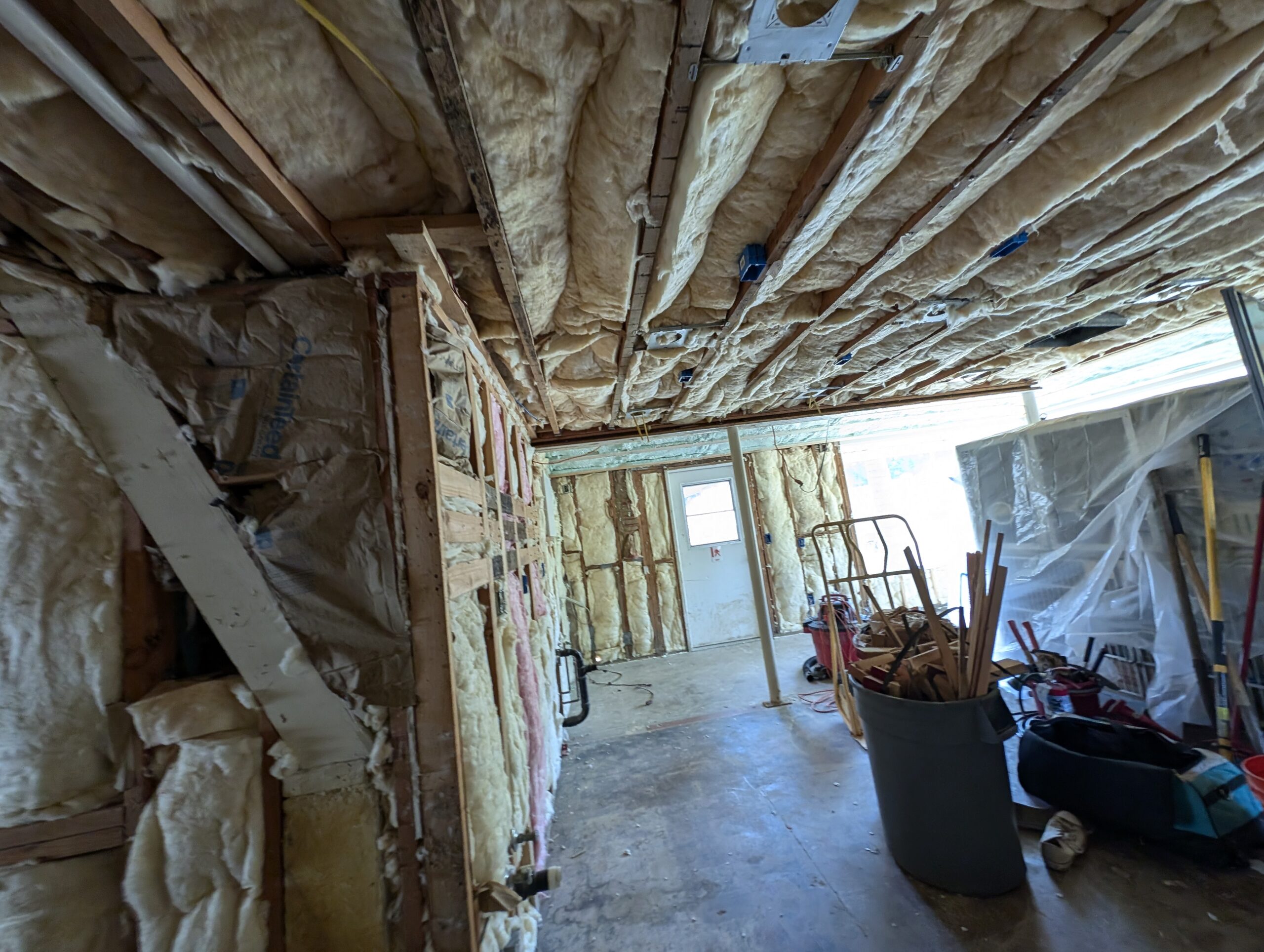 A room featuring insulation on the walls