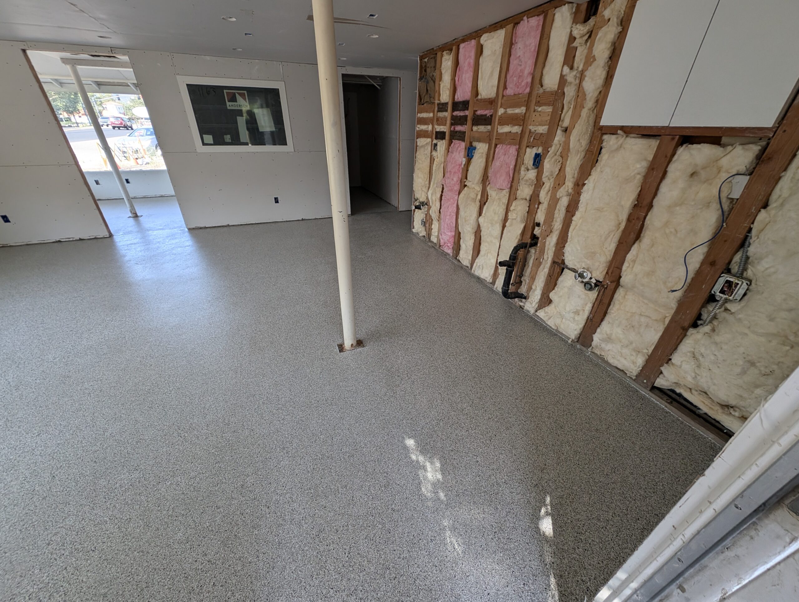 A room featuring a white floor